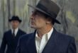 Gilles Lellouche, coiffé d’un chapeau, dans le rôle de Jean Moulin dans Moulin (2026).